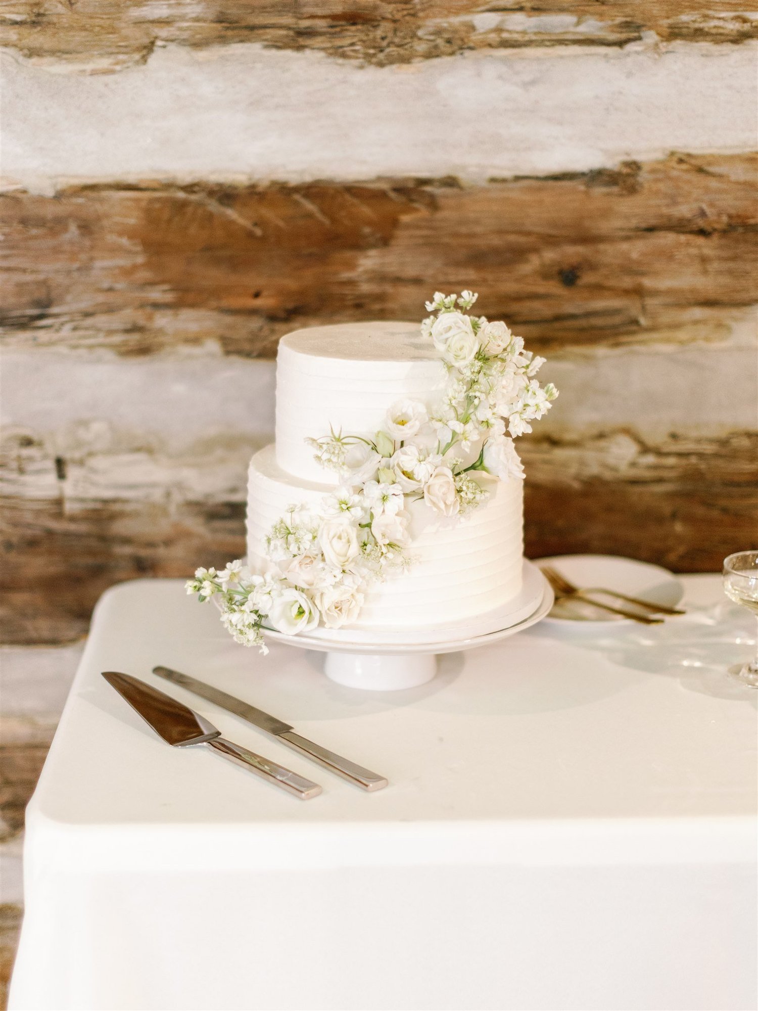 Bride walking down the aisle with cascading bouquet