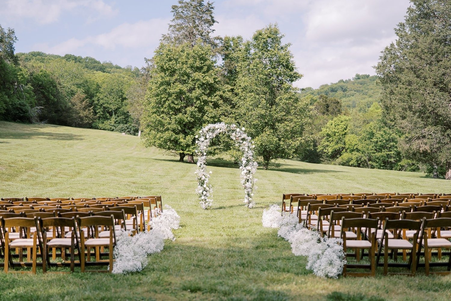 Elegant ceremony aisle floral design